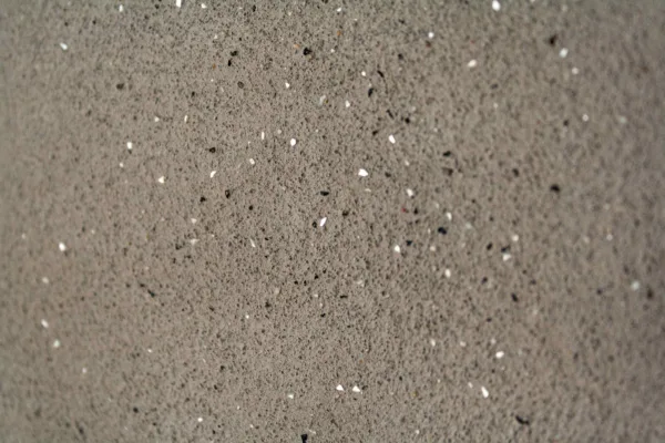 Artisan Stucco Floated lime plaster in pearl gray, with black mica and mother-of-pearl flakes